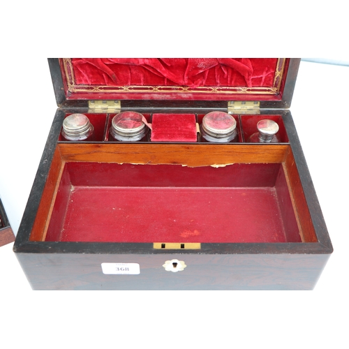 368 - A 19th century rosewood dressing box, the fitted interior with silver plated cosmetic jars and jewel... 