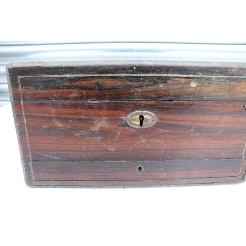 369 - A George III coromandel dressing box retailed by T Briggs, the fitted interior with an assortment of... 