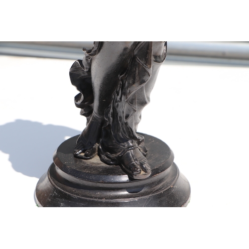 405 - A neoclassical figural  mystery clock, 64cms high.