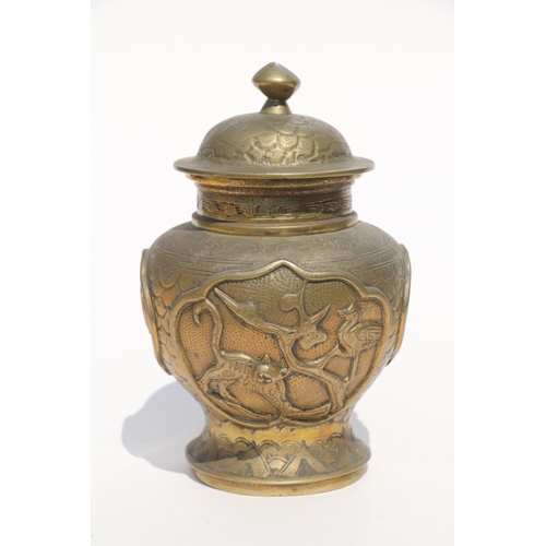 693 - A Chinese polished bronze / brass two-handled censer with six character mark to the underside, 11cms... 