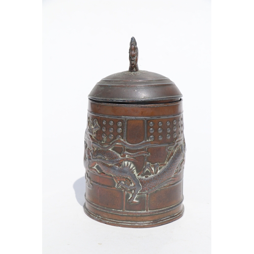 693 - A Chinese polished bronze / brass two-handled censer with six character mark to the underside, 11cms... 