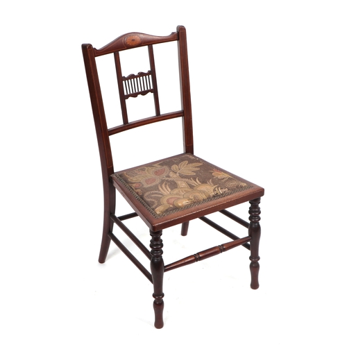 979 - A late Victorian / Edwardian child's stained beach chair with inlaid decoration and turned front leg... 