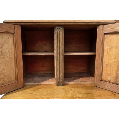 1001 - A 19th century Aesthetic period pitch pine and burr wood sideboard, the super-structure with two cup... 