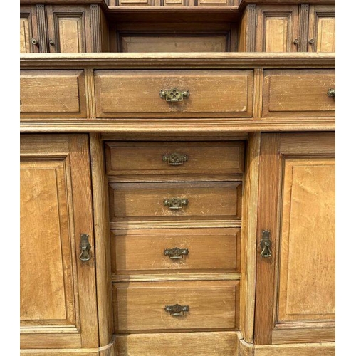 1001 - A 19th century Aesthetic period pitch pine and burr wood sideboard, the super-structure with two cup... 