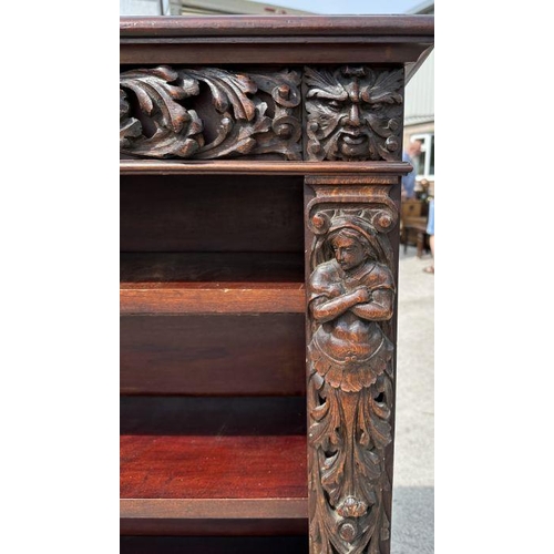 1007 - A pair of Victorian mahogany open bookcases, the frieze and sides decorated with applied carved oak ... 