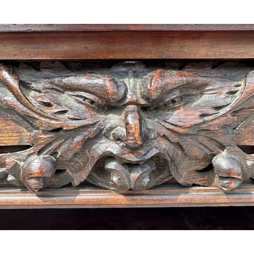 1007 - A pair of Victorian mahogany open bookcases, the frieze and sides decorated with applied carved oak ... 