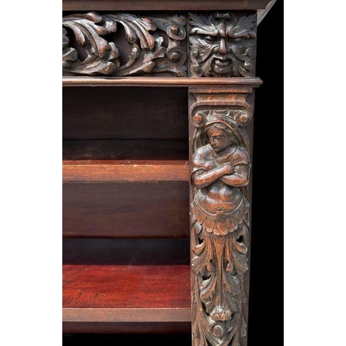 1007 - A pair of Victorian mahogany open bookcases, the frieze and sides decorated with applied carved oak ... 