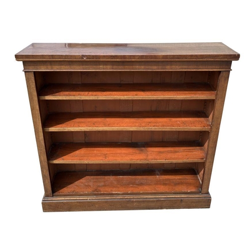 1009 - A Victorian mahogany open bookcase, on a plinth base, 124cm wide.