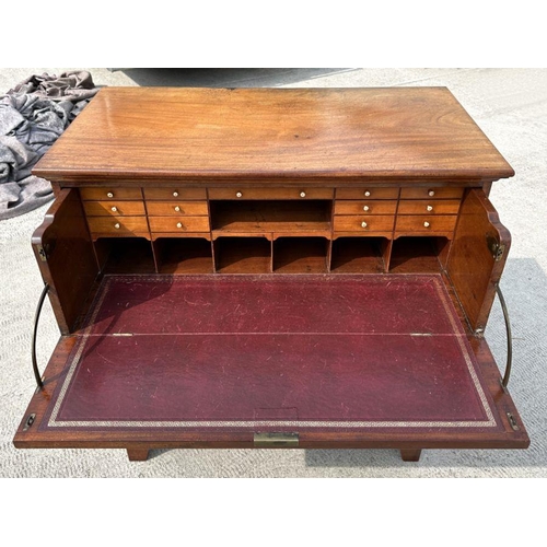 1011 - A George III mahogany secretaire chest, the secretaire section with fitted interior of thirteen draw... 