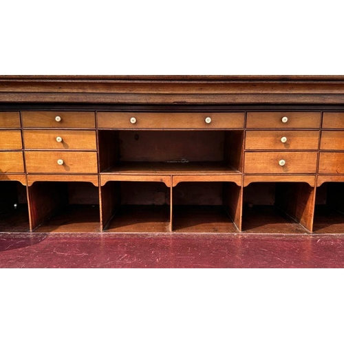 1011 - A George III mahogany secretaire chest, the secretaire section with fitted interior of thirteen draw... 