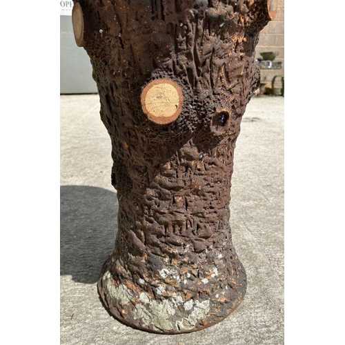 13 - A large terracotta planter in the form of a tree stump, 94cm high, 56cm diameter