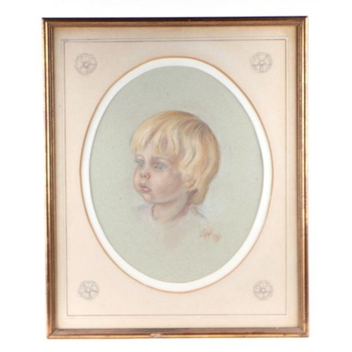 223 - 20th century British School - a pair of head & shoulder portraits depicting young boys, pastel, ... 