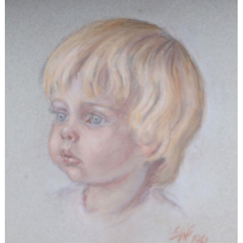 223 - 20th century British School - a pair of head & shoulder portraits depicting young boys, pastel, ... 