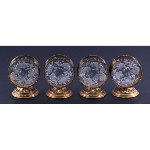 292 - A set of four Baccarat style glass and gilt metal tooth pick holders, each having a reverse engraved... 