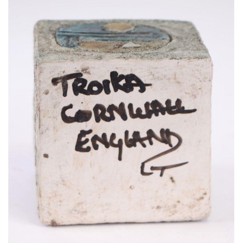 314 - A Troika cube vase with raised and incised geometric decoration, initialled 'LT' for Linda Taylor, 8... 