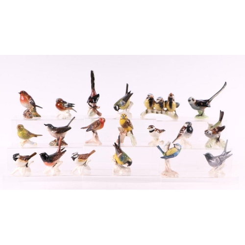 315 - A quantity of Goebel birds to include Greenfinch, Crested Tit and a Beswick Robin and a Beswick Whit... 