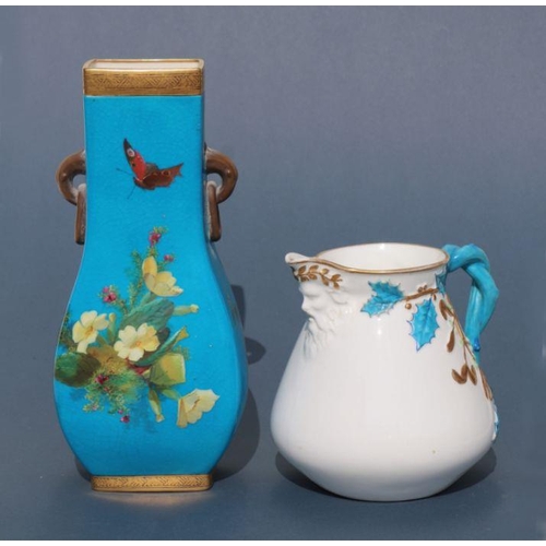 317 - A Minton Aesthetic Movement two-handled vase decorated with butterflies, puce mark to the underside,... 