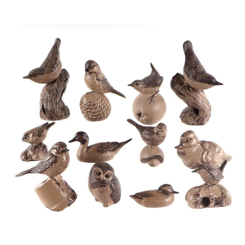 328 - A quantity of Poole Pottery stoneware birds to include Nuthatch, Wren, Owl and Goldcrest, the larges... 