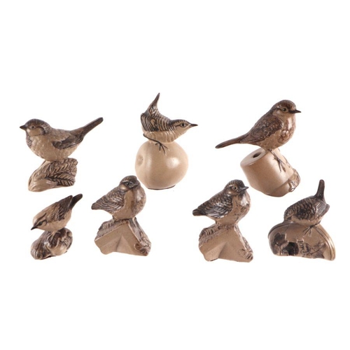 328 - A quantity of Poole Pottery stoneware birds to include Nuthatch, Wren, Owl and Goldcrest, the larges... 