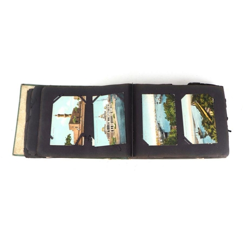 33 - An early 20th Century postcard album containing topographical cards to include Ceylon and South Amer... 