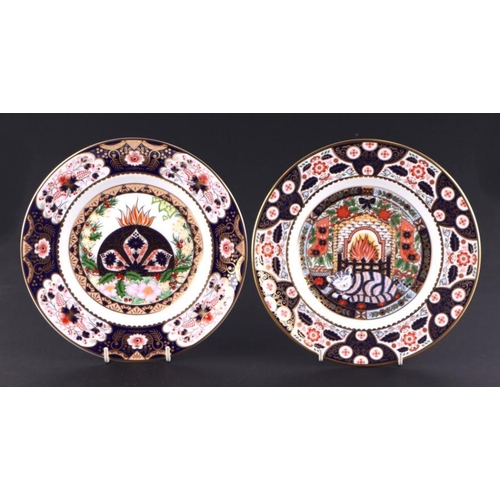 344 - A set of four Royal Crown Derby limited edition Christmas plates, 1997, 1998,1999, and 2000; togethe... 