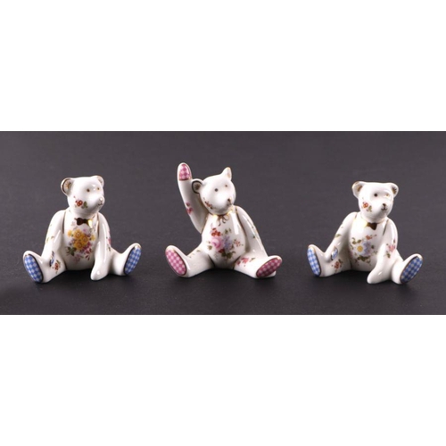 348 - A group of Royal Crown Derby Posy bears to include a special edition Bennetts Shopper Bear, all boxe... 