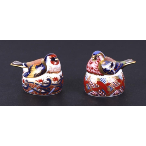 361 - A group of Royal Crown Derby paperweights, Robin Nesting, Bullfinch Nesting, Goldfinch Nesting, and ... 