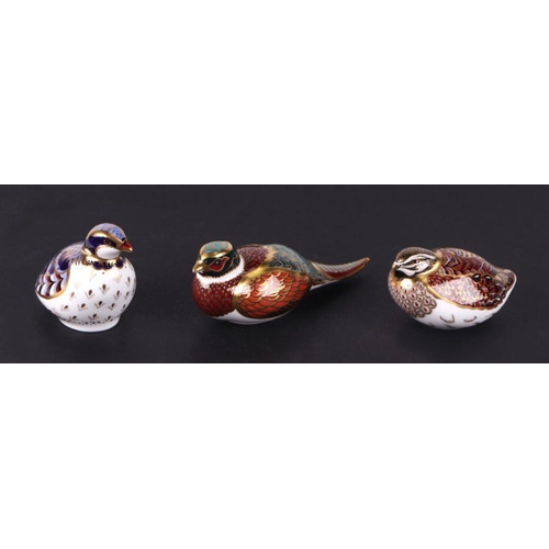 371 - A group of Royal Crown Derby paperweights, Red Legged Partridge, anniversary edition; Dappled Quail;... 