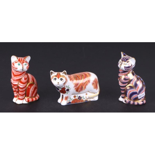 379 - A group of Royal Crown Derby paperweights, Collectors Guild Cat Sugar; Mother Cat; Contented Cat; Gi... 