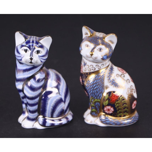 380 - A group of Royal Crown Derby paperweights, Fireside Cat, limited edition 162/950, boxed with certifi... 