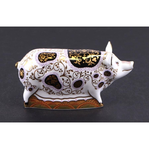 395 - A group of Royal Crown Derby paperweights, Bluebell Calf; Spotty Pig, limited edition; and Nanny Goa... 