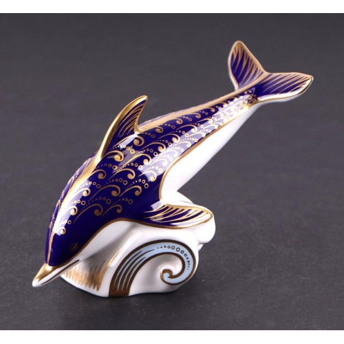 406 - Three Royal Crown Derby paperweights, Oceanic Whale, exclusive for the Collector's Guild; Dolphin; a... 