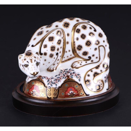 457 - Two Royal Crown Derby paperweights, Snow Leopard, special limited edition 230/250, on a wooden plint... 