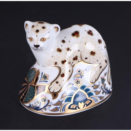 457 - Two Royal Crown Derby paperweights, Snow Leopard, special limited edition 230/250, on a wooden plint... 