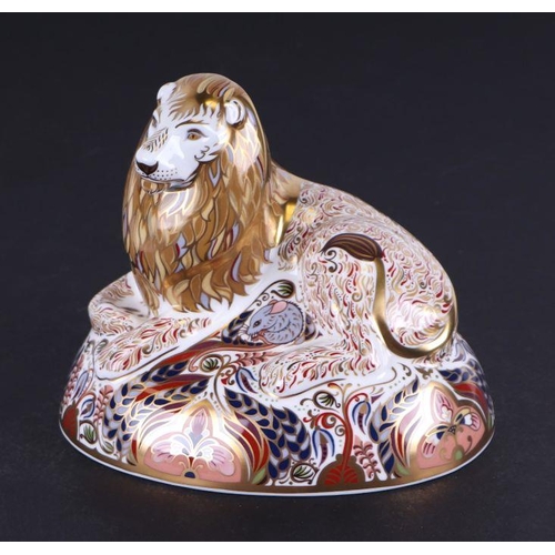 458 - A Royal Crown Derby paperweight, Lion, with gold stopper and boxed.