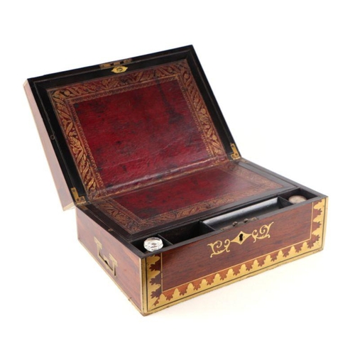 513 - A Regency mahogany writing slope with brass inlay decoration, 36cms wide.