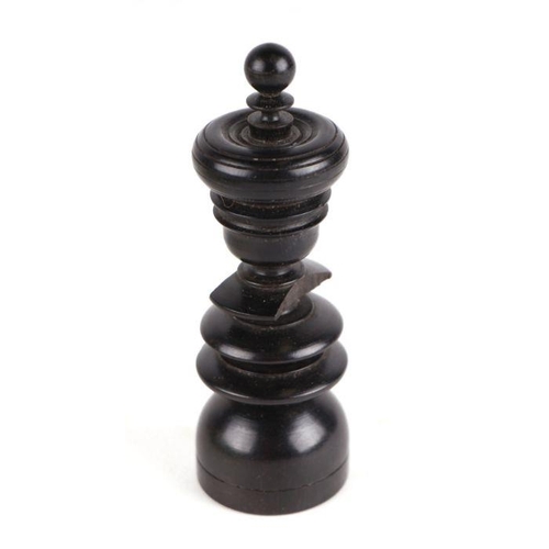 522 - A large boxwood and ebonised chess set; together with a matching set of draughts.