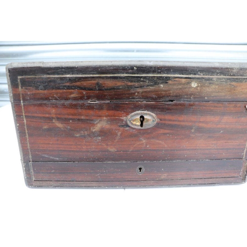 539 - A George III coromandel dressing box retailed by T Briggs, the fitted interior with an assortment of... 