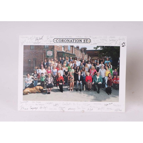 550 - A quantity of Coronation Street memorabilia to include a signed pub drinks tray, signed publicity ca... 