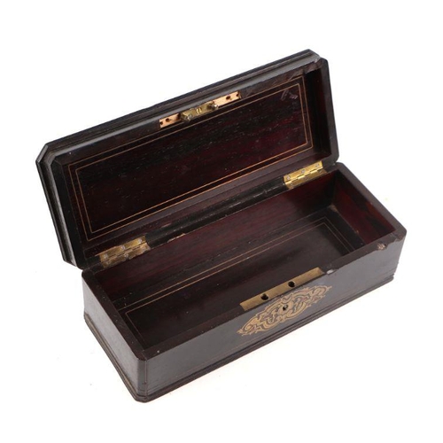 561 - A 19th century French boulle work pen box, 27cms wide.