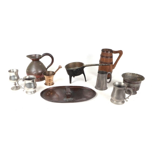 573 - Three boxes of assorted copper and metal wares including a copper cauldron, brass fire irons, a copp... 