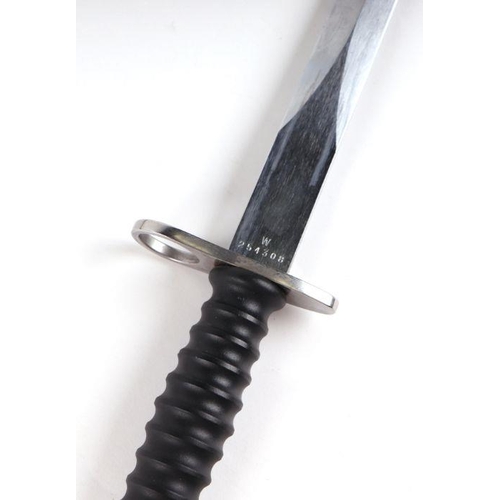 58 - A Swiss M1957 Schmidt Rubin bayonet for the STGW 57, in its scabbard with leather frog. Makers mark ... 