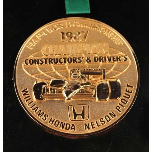 606 - A 1987 FIA-F1 constructors and drivers winners medallion, award to Williams Honda - Nelson Piquet, c... 