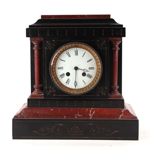 629 - A Victorian black slate and rouge marble mantel clock, the white enamel dial with Roman numerals, 29... 