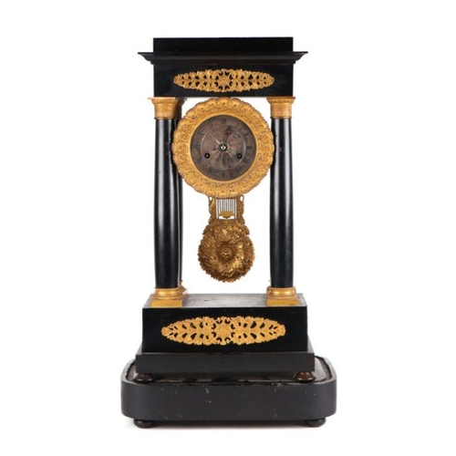 632 - A 19th century ebonised French Portico clock with ormolu mounts, the silver dial with Roman numerals... 