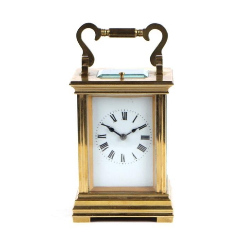 635 - A late 19th century / early 20th century French carriage clock, the rectangular white dial with Roma... 