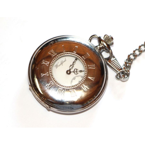 635A - A Woodford half hunter pocket watch, model number 1011 with Albert chain, cased with certificate.