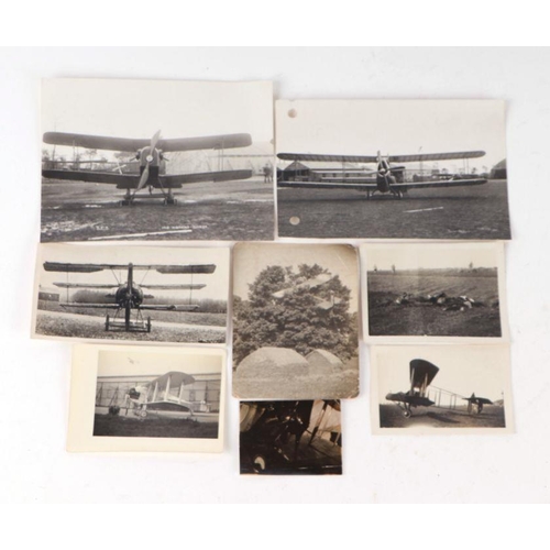 64 - A group of WWI black & white photographs featuring a Fokker triplane, S.E.5, DHIV, crashed etc, ... 