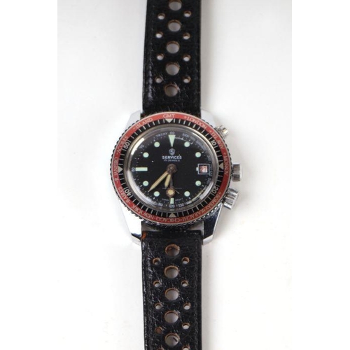 642 - A Services GMT wristwatch having a black dial with date aperture and tachymeter track and outer beze... 