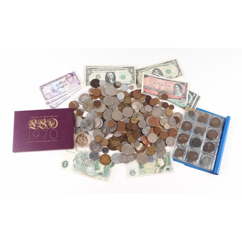 648 - A quantity of mixed loose coinage and bank notes to include one pound notes.